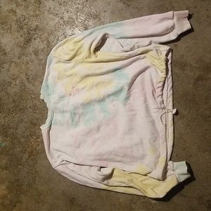 Soft t shirt with elastic tie to tighten bottom.